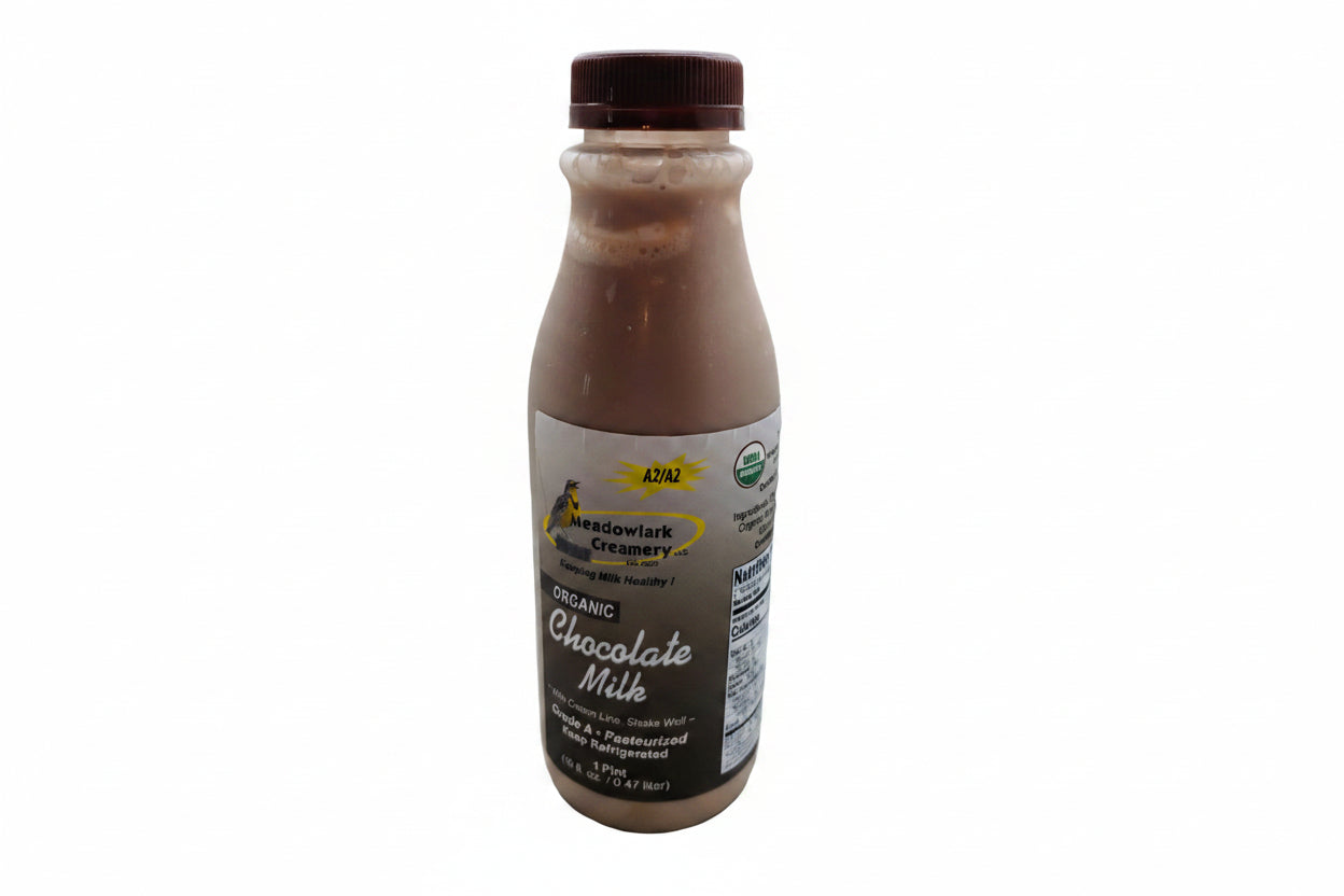 Bottle of Meadowlark Creamery Organic Chocolate Milk on a white background