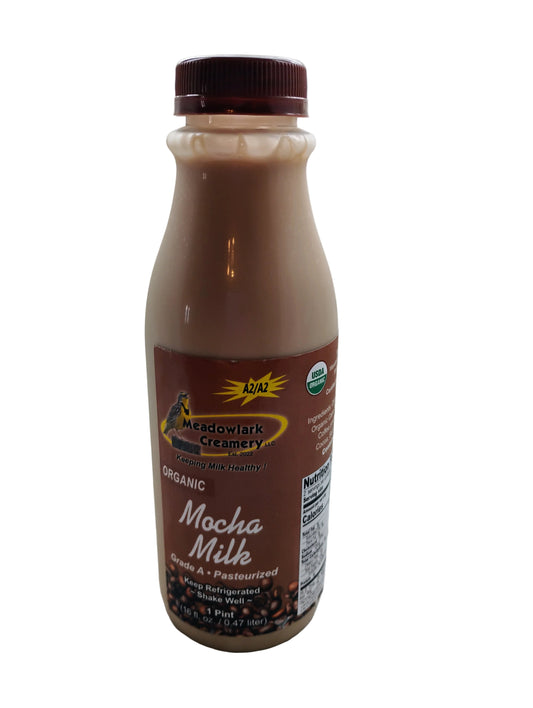 Bottle of Meadowlark Creamery Mocha Milk on a white background